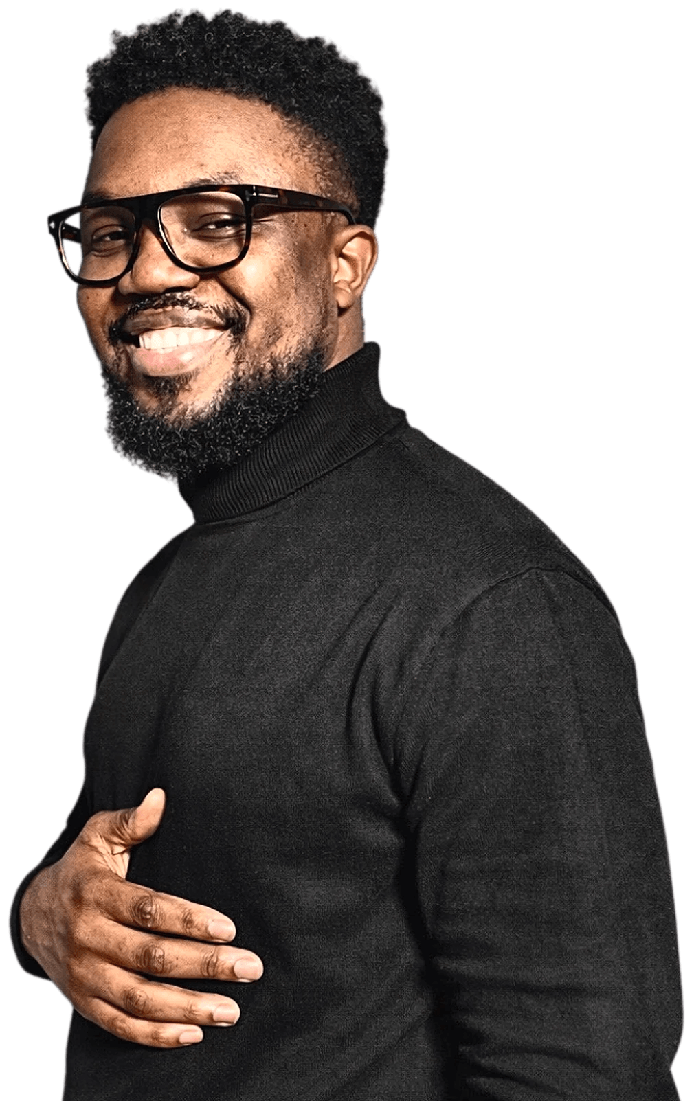 Sydney Scott Sam in a black turtleneck and glasses, smiling, hand on his chest